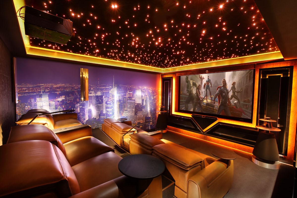 Stunning home cinema room with twinkle lights in ceiling and leather movie seating