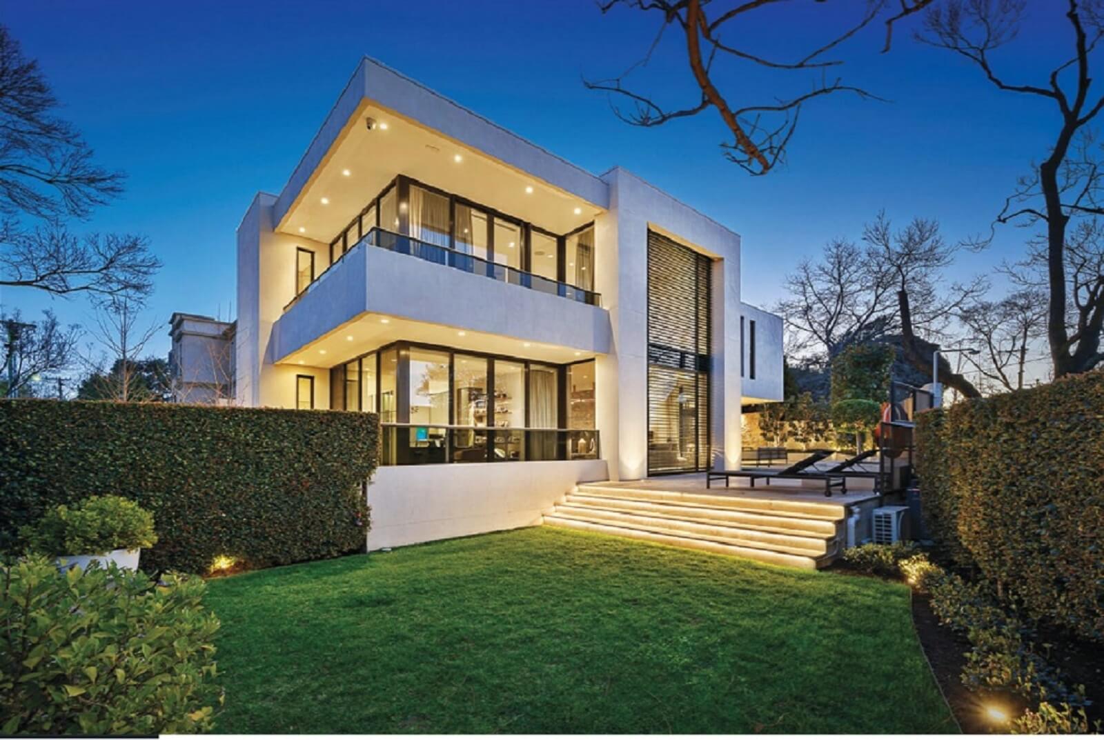 Stunning well lit facade of Toorak home automation mansion